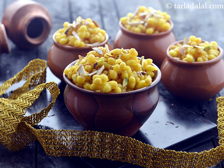 Step 21 – Serve<strong> sweet boondi </strong>immediately garnished with cardamom powder, pistachio slivers and almond slivers. In Gujarati …