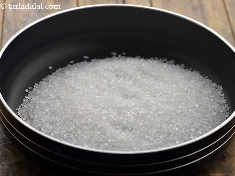 Step 5 – Meanwhile, take sugar in a broad non-stick pan.