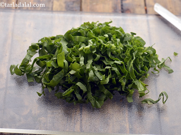 Step 23 – Place them on a chopping board and shred them.