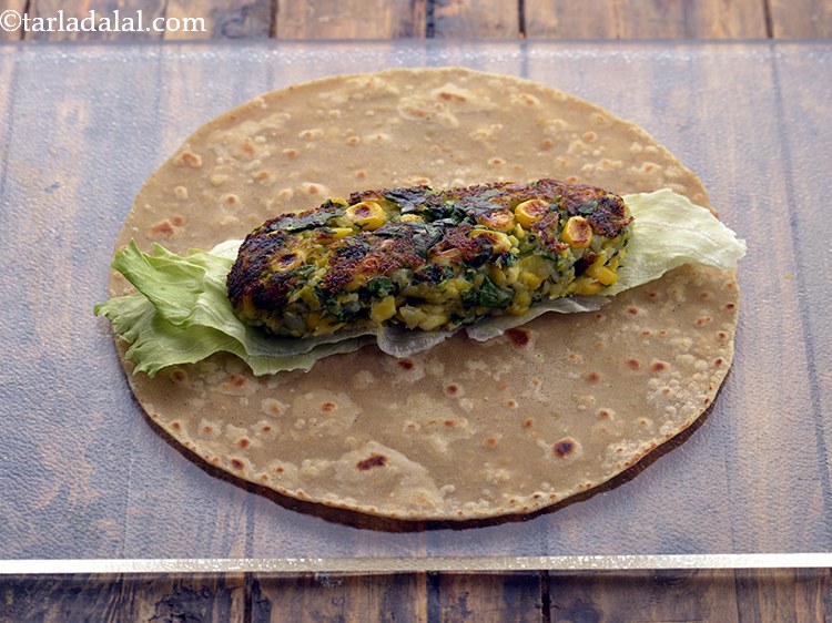 Step 41 – Place a roll on the lettuce. If making for kids, you may add grated processed …