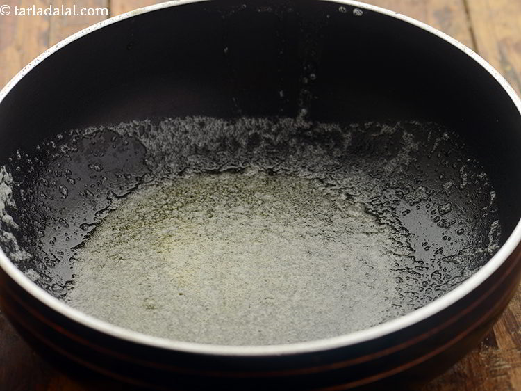 Step 5 – Further, heat butter in a deep non-stick pan.