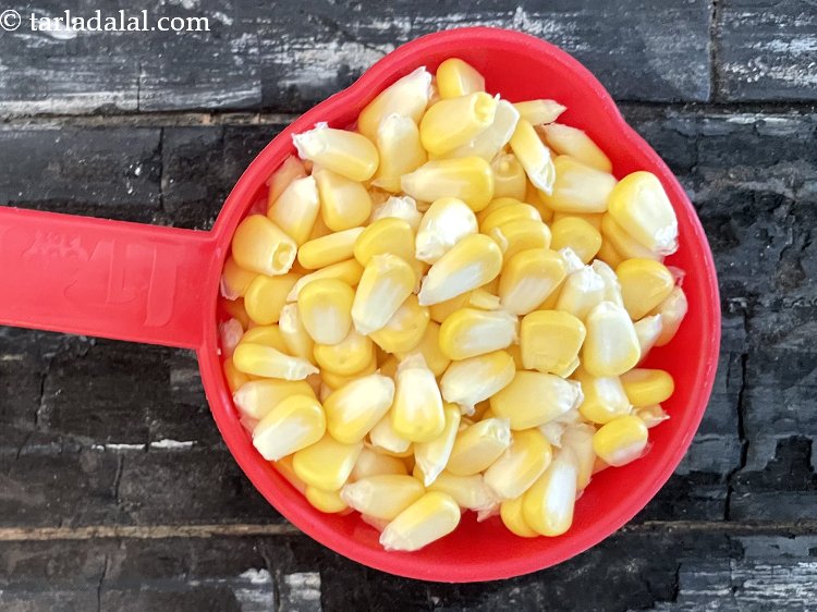 Step 7 – After 30 minutes, add 1/2 cup&nbsp;<a href="https://www.tarladalal.com/glossary-sweet-corn-kernels-makai-ke-dane-156i">sweet corn kernels (makai ke dane)</a>.