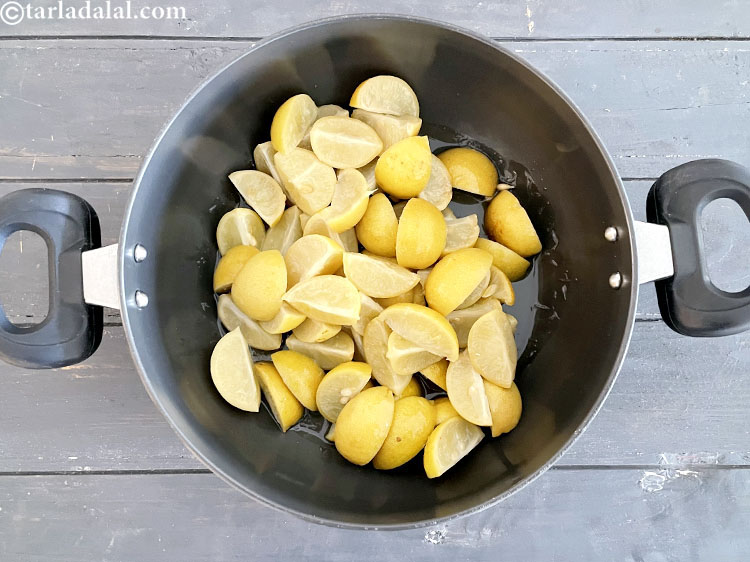Step 23 – Transfer the lemon-salt mixture after maturing in a deep non-stick pan.