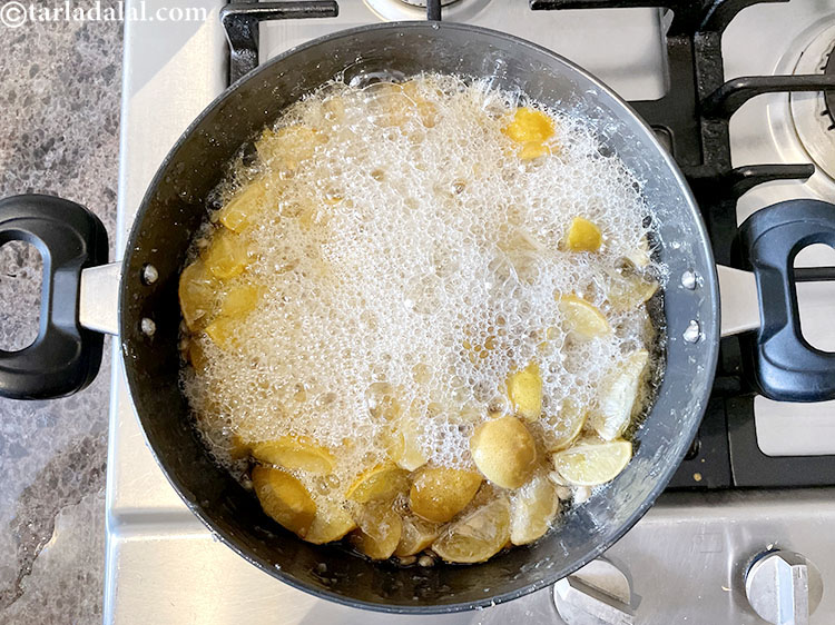 Step 31 – At 14 minutes, reduce flame to low and cook. Image 7 of cooking.