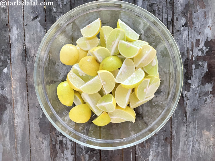 Step 6 – Cut each lemon into quarters.