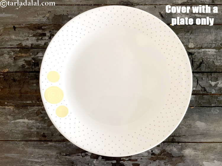 Step 10 – Cover with a lid and keep aside for 7 days. Cover with a glass plate …