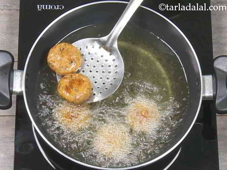 Step 16 – Do not deep fry more than 4 to 5 tikkis at a time. Also keep …