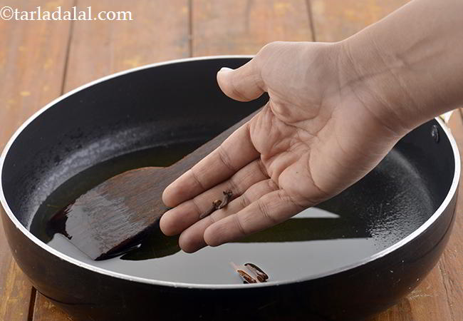 Step 18 – Now add the cloves to this. You can even add cardamom pods to give an …