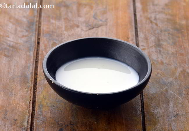 Step 14 – Take a small bowl and add the warm milk to it.