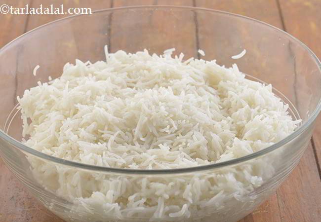 Step 11 – Put the cooked rice in a bowl.
