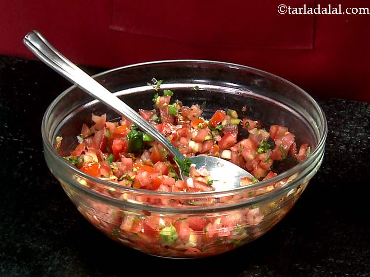 Step 20 – Combine and mix all the ingredients for the uncooked salsa well and lightly mash with …