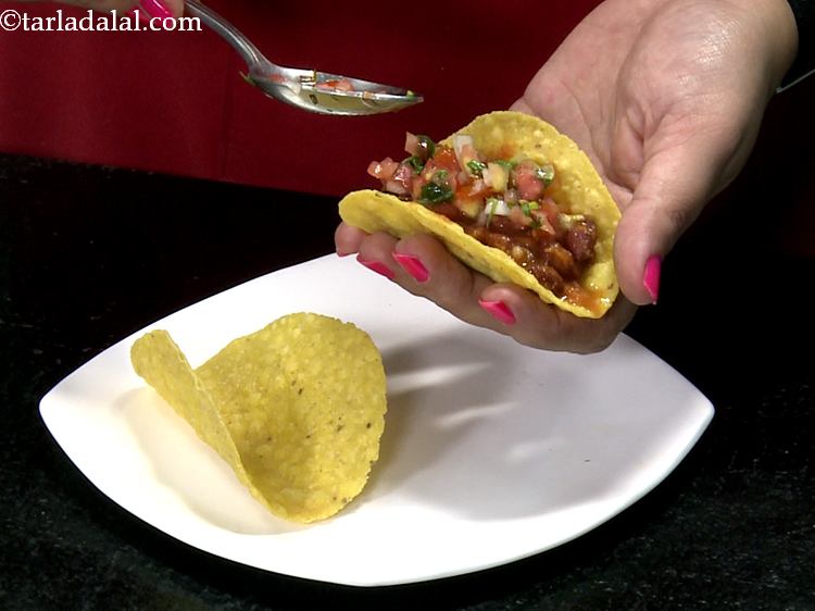 Step 22 – Top it with 1/2 tablespoon of uncooked salsa. You can even add guacamole, sour cream.&nbsp;