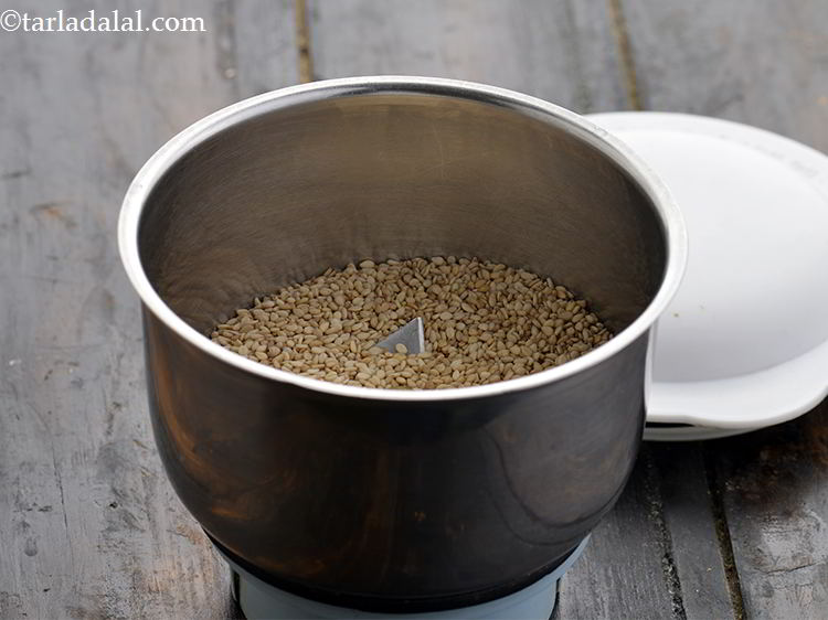Step 25 – Transfer the sesame seeds to a mixer jar.&nbsp;