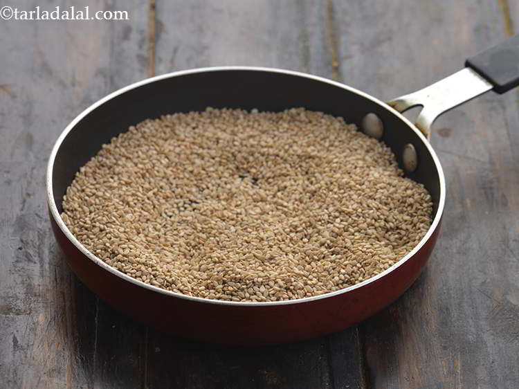 Step 21 – For making the&nbsp;<strong>Lebanese tahini paste</strong>&nbsp;at home, firstly take a small broad non-stick pan &amp; add …