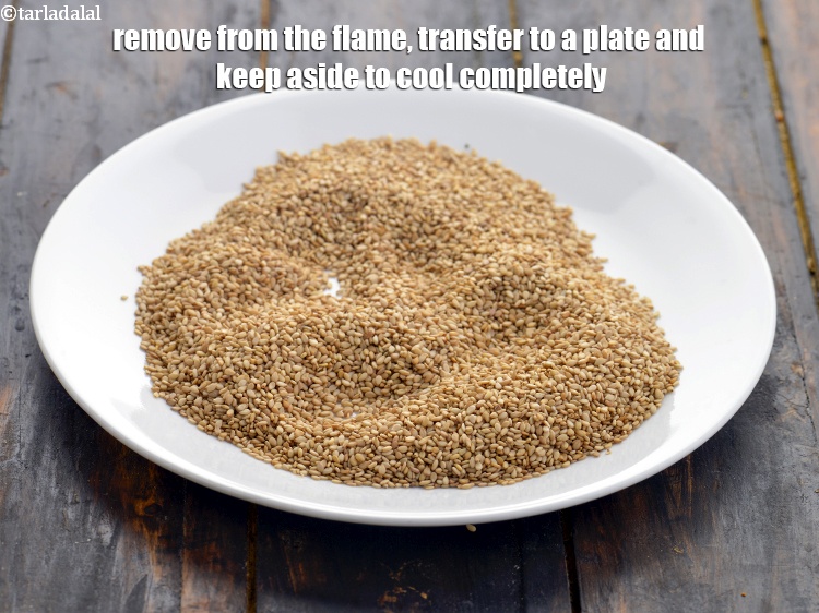 Step 17 – Remove from the flame, transfer to a plate and keep aside to cool completely.<br /> …