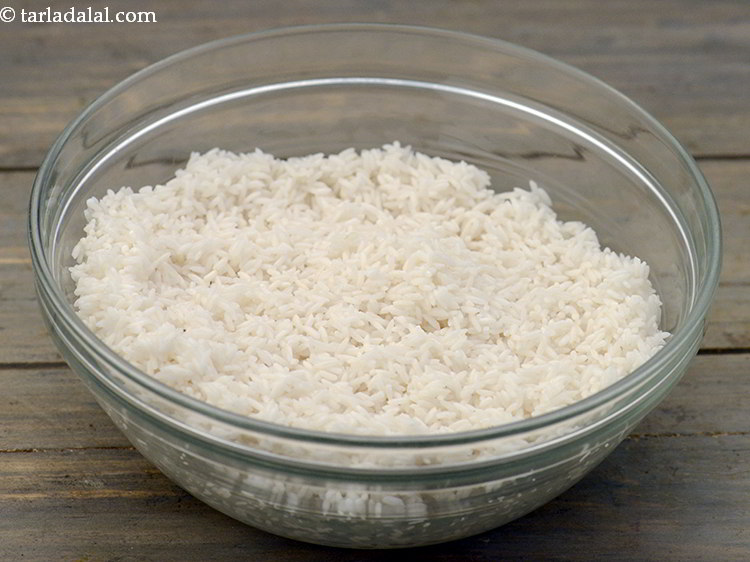 Step 2 – <p>To begin making the <strong>tamarind rice</strong>, you can either pressure cook the rice or cook …