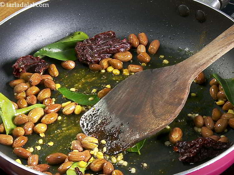 Step 32 – <p>Mix well and sauté on a medium flame for a minute, while stirring continuously or …