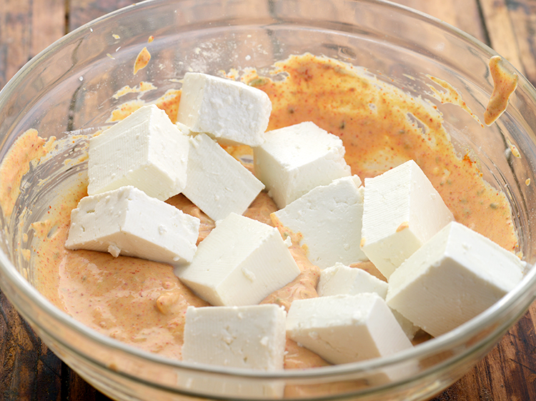 Step 17 – To the prepared marinade, add paneer cubes.