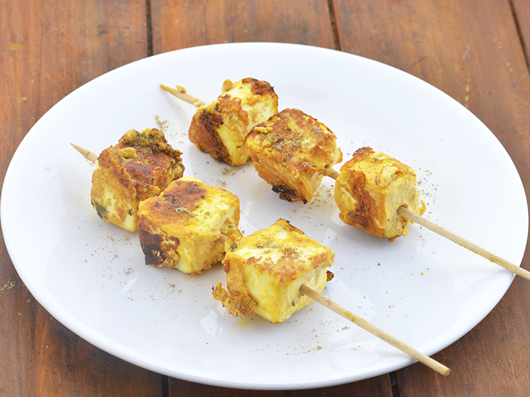 Step 23 – Carefully remove <strong>paneer tikka</strong> them in a plate.&nbsp;Sprinkle &frac12; tsp chaat masala evenly over it. …