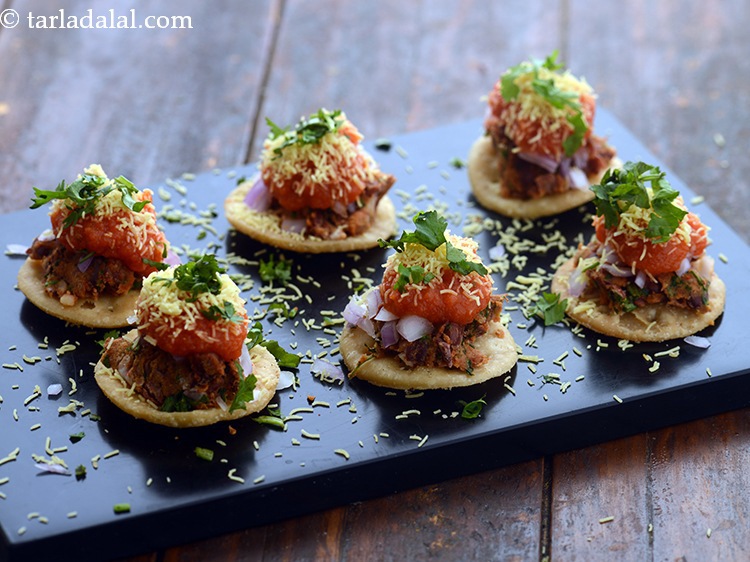 Step 33 – Garnish rajma sev puri with coriander.