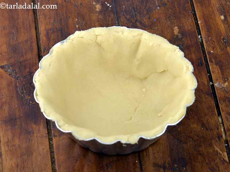 Step 8 – Place the circle into a 75 mm. (3?) diameter tart case and press the circle …