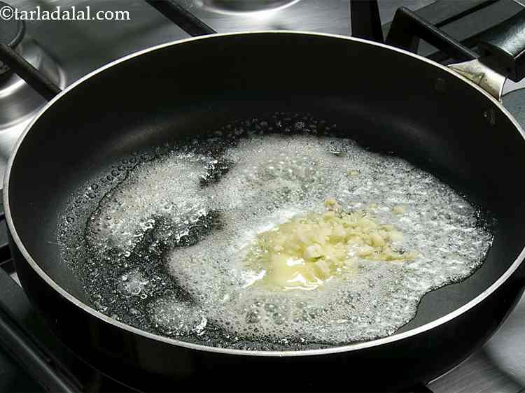 Step 1 – Heat the butter in a broad non-stick pan, add the garlic.