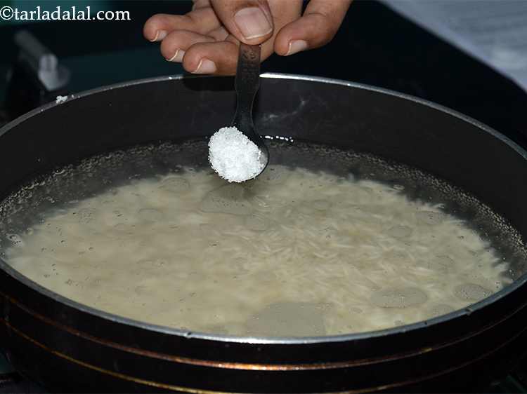 Step 5 – Add the soaked and drained rice and salt to taste.