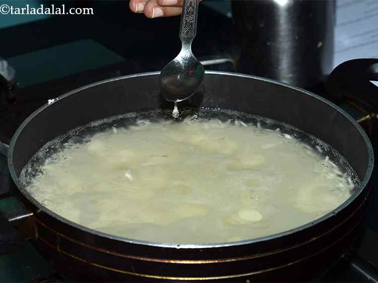 Step 6 – Add &frac12; tablespoon oil and mix well.