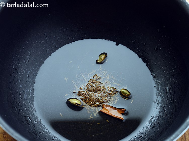 Step 16 – Add cardamoms and cinnamon.