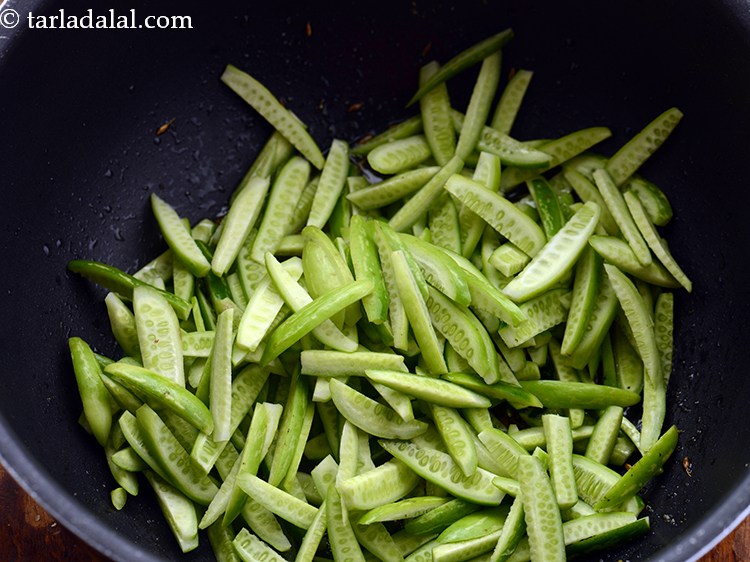 Step 22 – Add the tendli. Tendli/tindora is a good source of Vitamin C along with Vitamin A, …