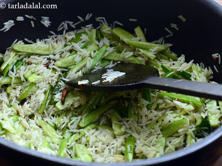 Step 24 – Mix gently and saut&eacute; on a medium flame for 2 minutes.