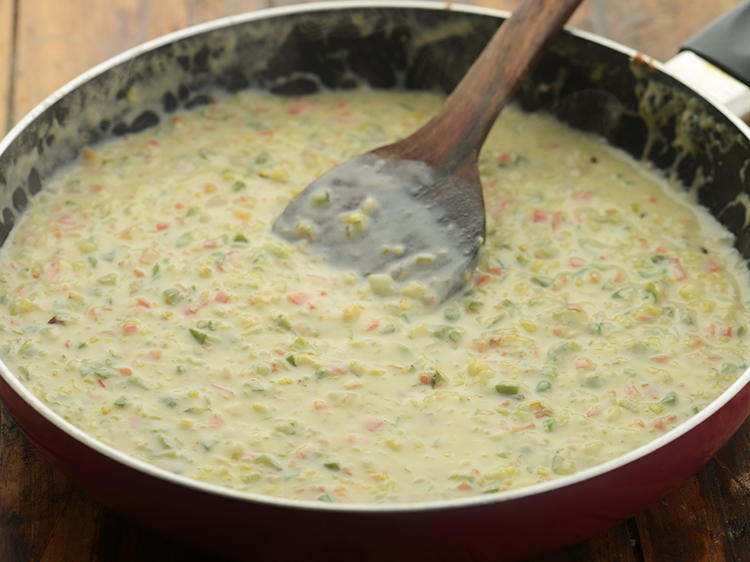 Step 14 – Mix well and cook on a medium flame for 2 minutes, while stirring continuously. Keep …