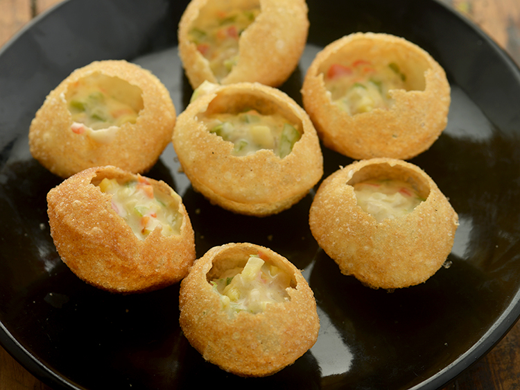 Step 16 – Fill each puri with approx. 2 tsp of the stuffing.