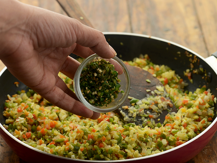 Step 9 – Add green chillies.