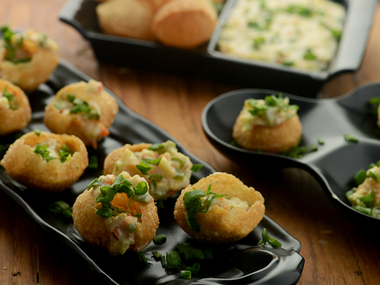 Step 18 – Serve mixed vegetables in coconut sauce served with puri immediately.