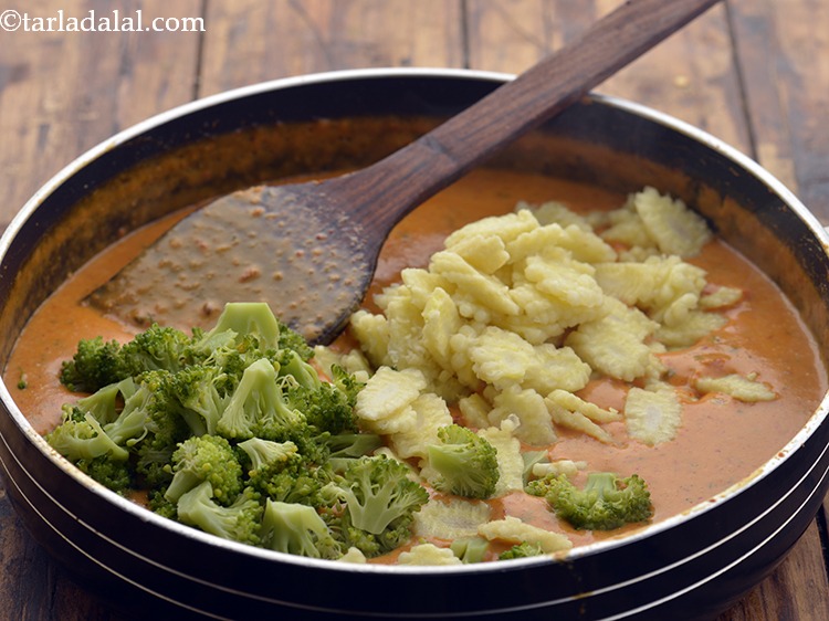 Step 19 – Add the baby corn and broccoli.