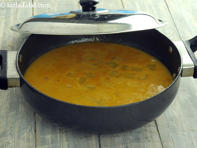 Step 27 – Mix well and cover it with a lid and cook on a medium flame for …