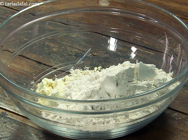 Step 4 – Add whole wheat flour. For a gluten-free version, skip adding atta.