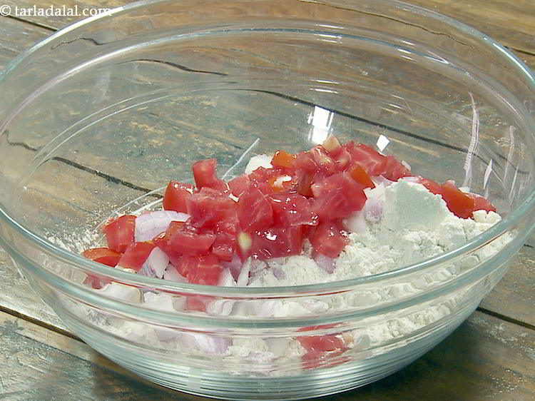Step 6 – Next add tomatoes. You can add any vegetables of your choice like shredded cabbage, grated …