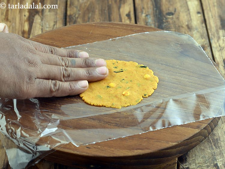 Step 21 – Lightly press the dough with your fingers evenly to make a 75 mm. (3&rdquo;) diameter …