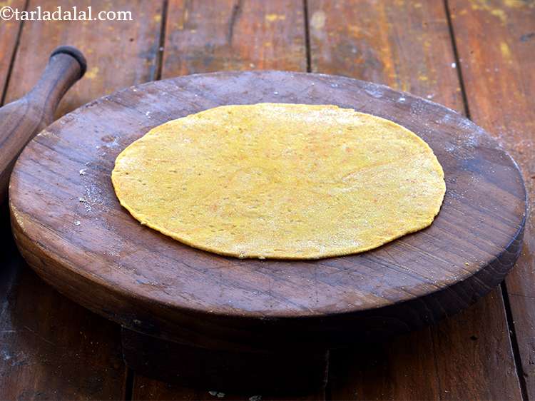 Step 15 – Roll it out thinly into a&nbsp; 175 mm. (7&rdquo;) diameter circle using a little wheat …