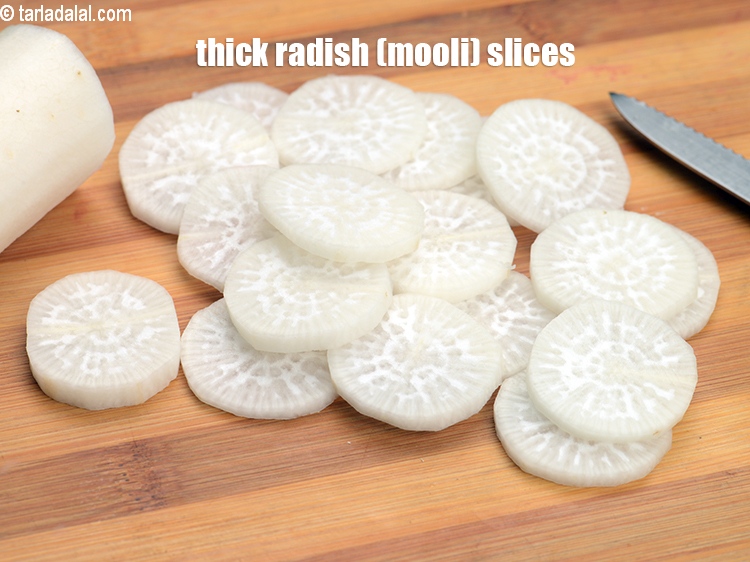 Step 35 – Thick radish (mooli) slices.