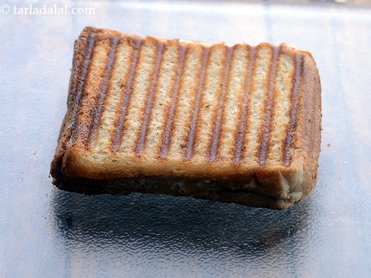 Step 13 – Grill in a pre-heated greased sandwich griller for 4 to 5 minutes or till it …