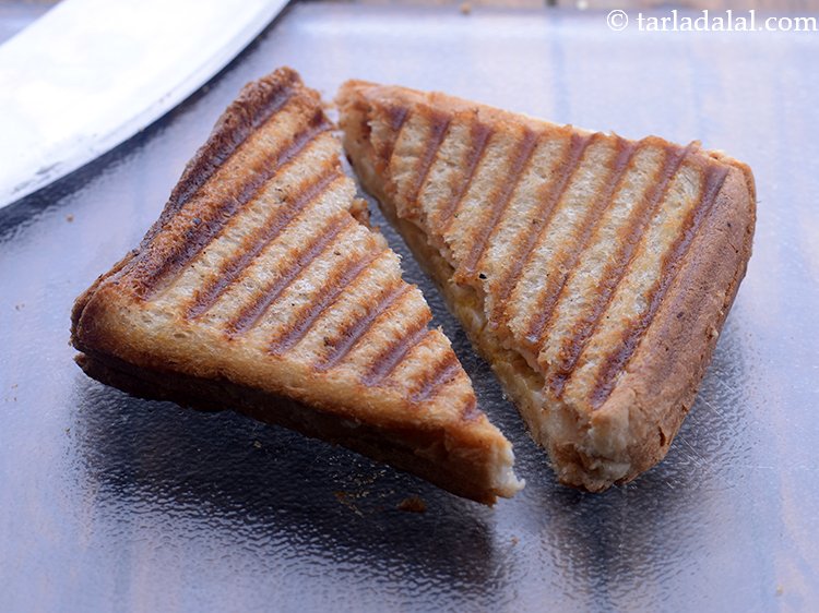 Step 14 – Cut the&nbsp;<strong>three layered cheese grilled sandwich | kids triple cheese grill sandwich | Indian style …