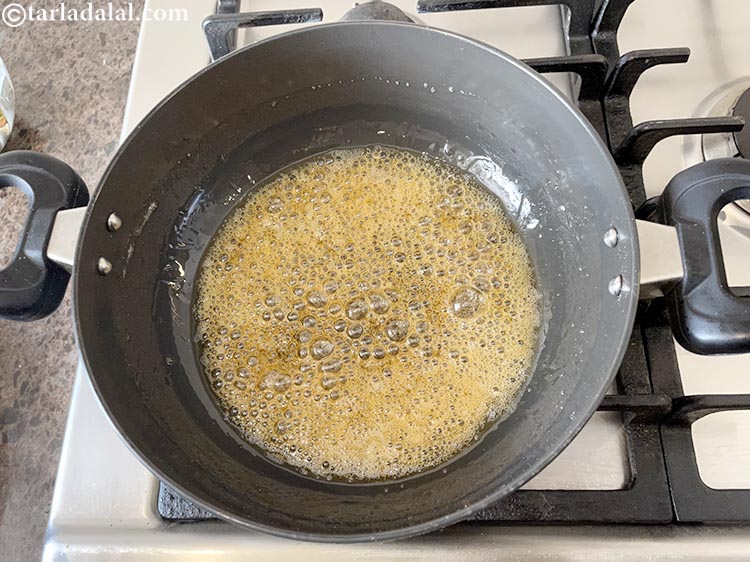 Step 11 – Mix well and cook on a medium flame for 3 minutes or till the jaggery …