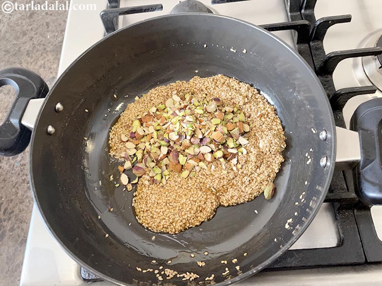 Step 13 – Add&nbsp;<meta charset="UTF-8" />almonds and pistachios.