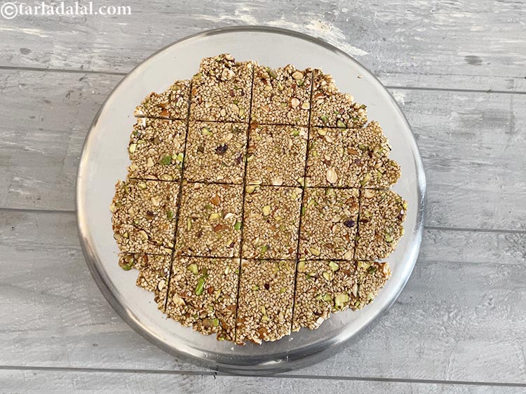 Step 19 – Cool <strong>til and dry fruit chikki |&nbsp;dry fruit til chikki&nbsp;|&nbsp;til dry fruit gud chikki&nbsp;|&nbsp;crispy til …