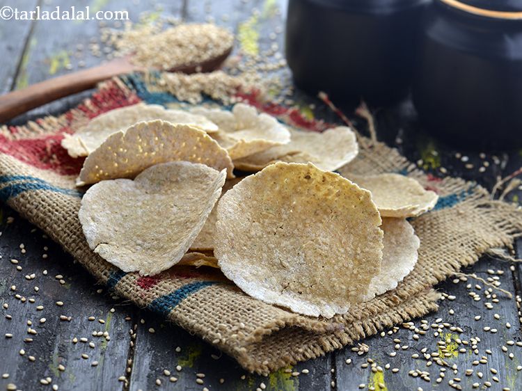 Step 16 – Cool completely and store the <strong>jowar and til puri</strong> in an air-tight container. <a href="https://www.tarladalal.com/Baked-Oats-Puri-39887r" …