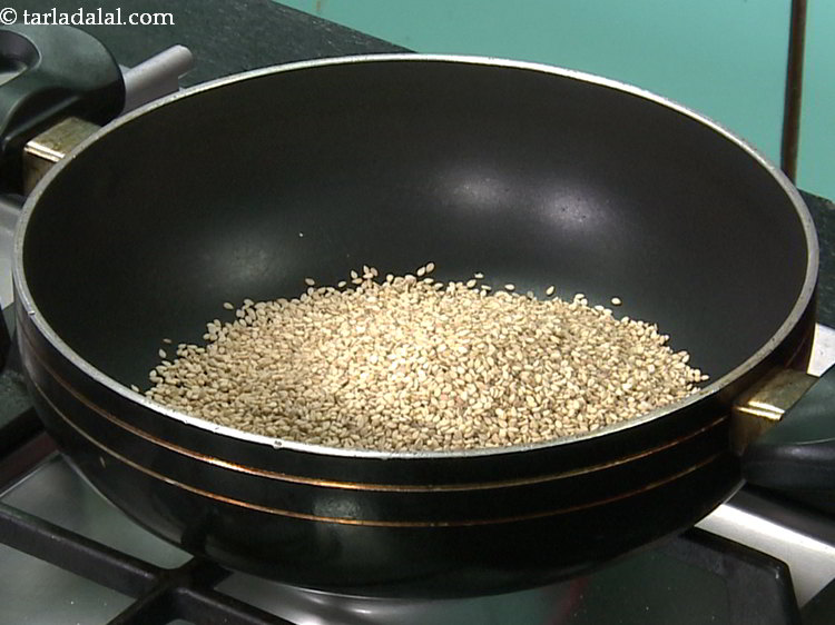 Step 4 – Place around &frac34; cup of sesame seeds in a deep non-stick pan. Using a deep …