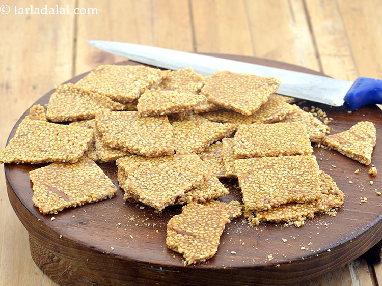 Step 16 – Then roughly break it into pieces preferably with your hand. This chikki is made with …